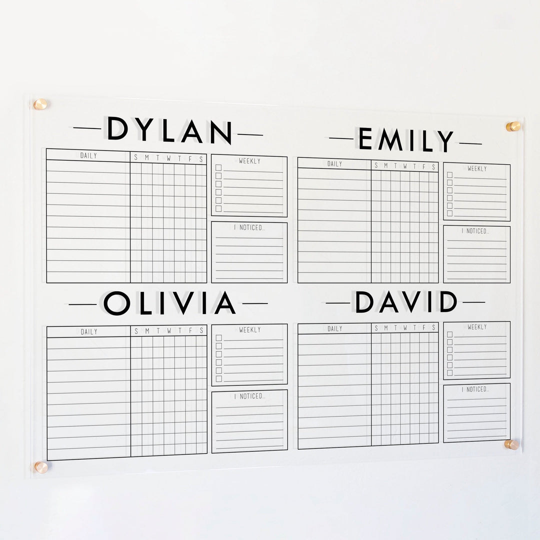 A Dry-erase acrylic chore chart hanging on the wall