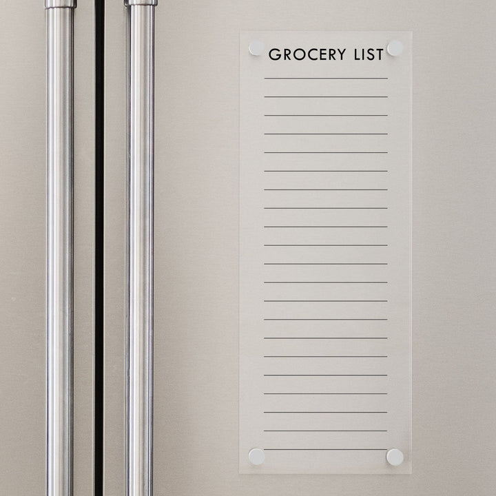 A dry-erase board made of clear acrylic with a custom title up top