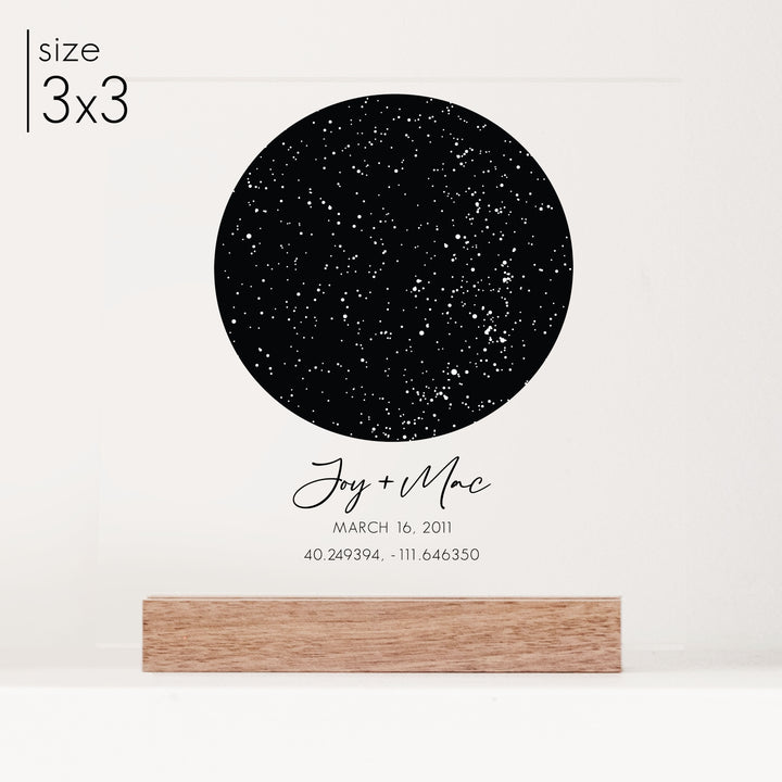 A 3x3 personalized star chart anniversary gift printed on clear acrylic with customized cursive titles.