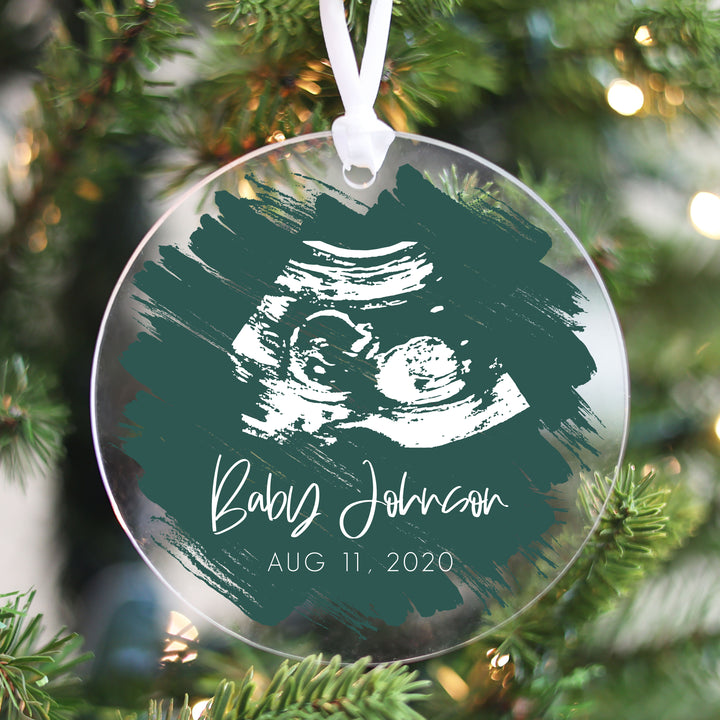 A white colored ultrasound on a jade brushed background.