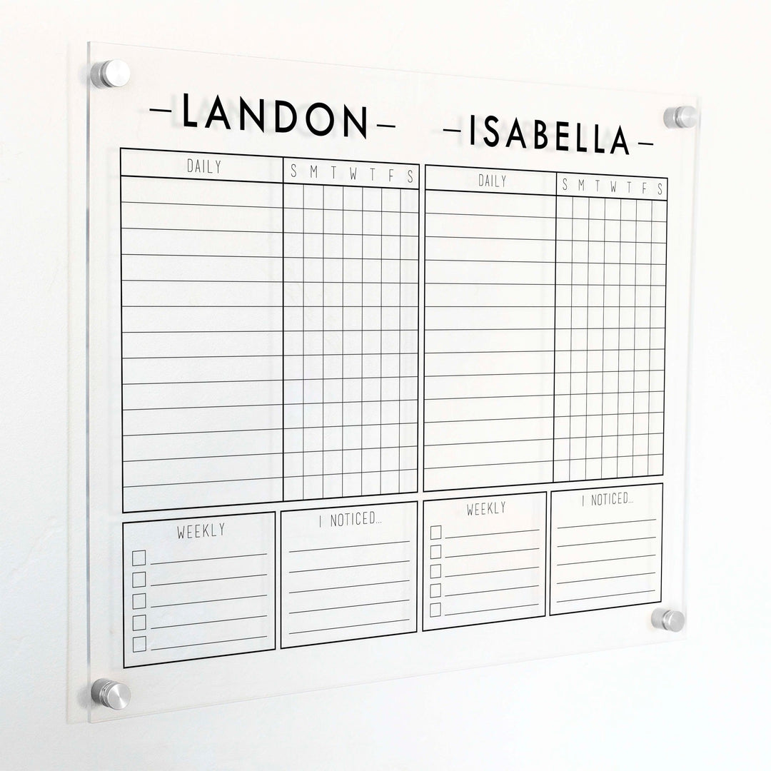 A Dry-erase acrylic chore chart hanging on the wall