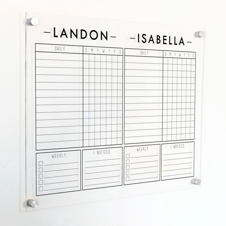 A Dry-erase acrylic chore chart hanging on the wall