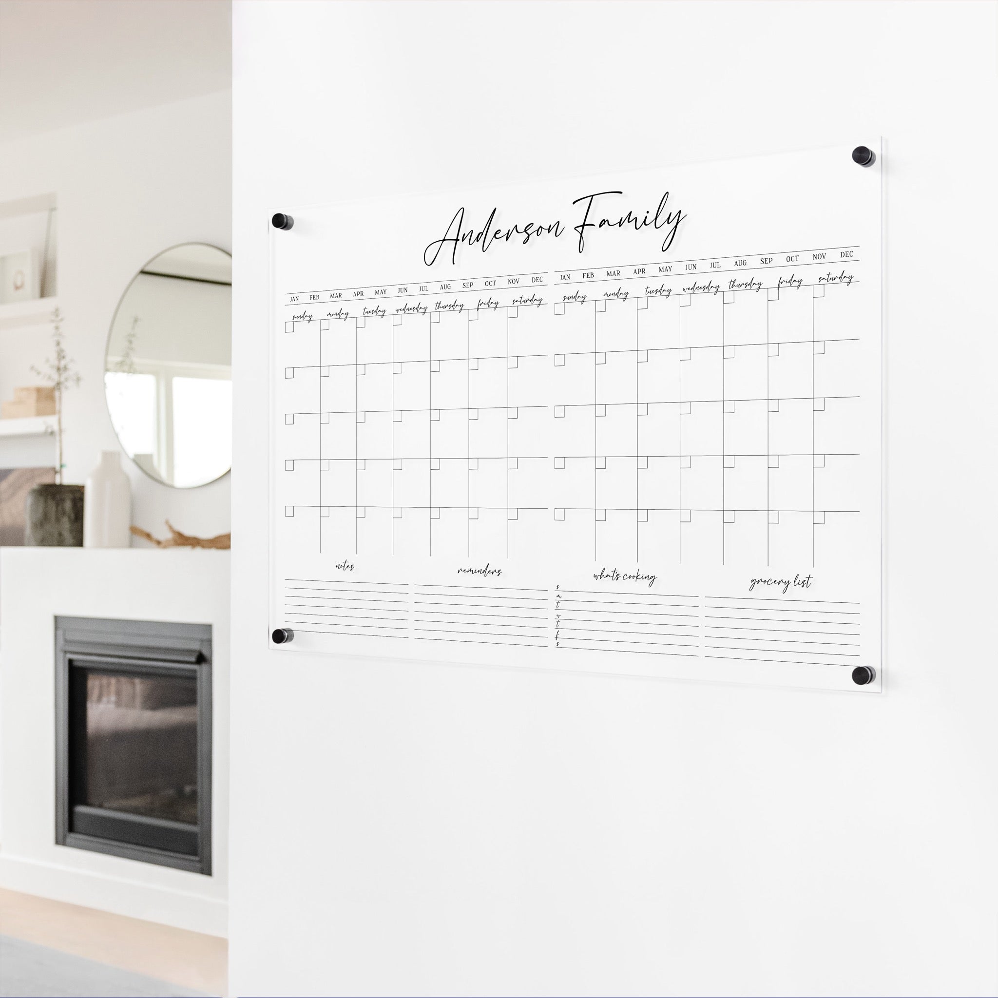 A Dry-erase acrylic calendar with a two month design format hanging on the wall