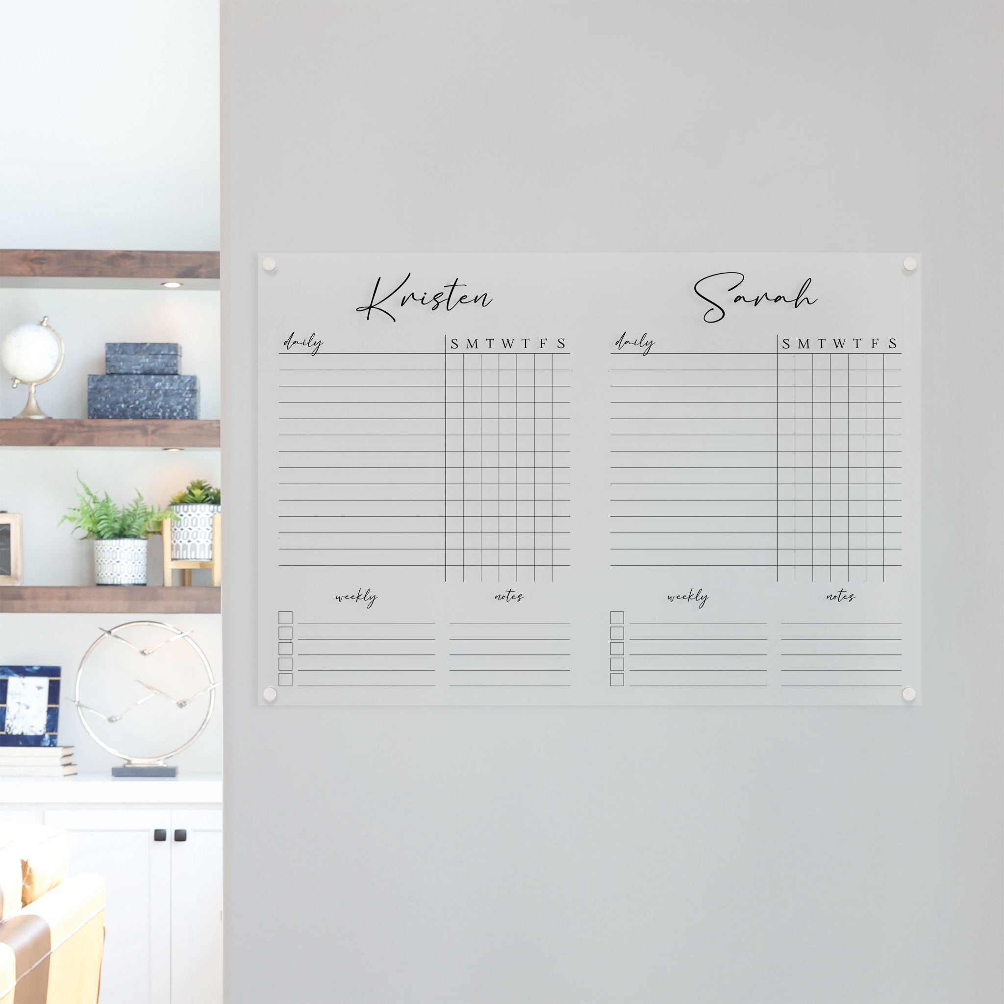 A Dry-erase acrylic chore chart hanging on the wall