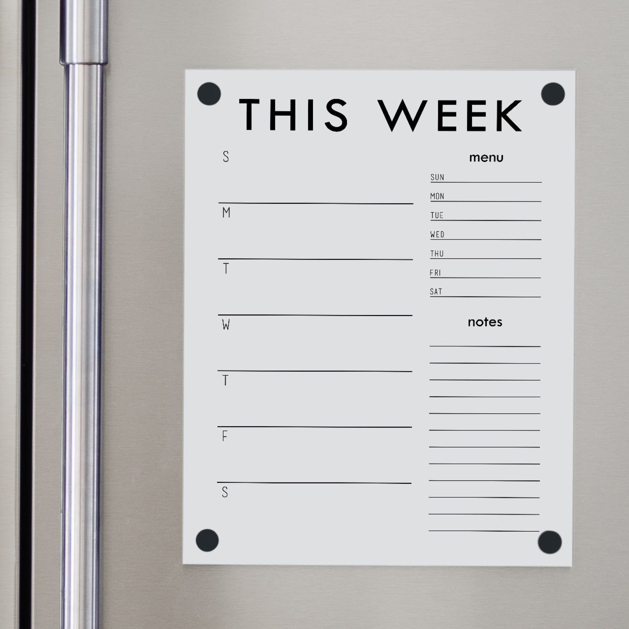 A Dry-erase weekly calender made of magnetic acrylic hanging on the fridge