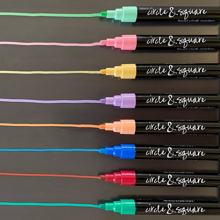 assorted colors of chalk marker pens