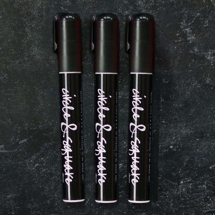 3 black chalk markers