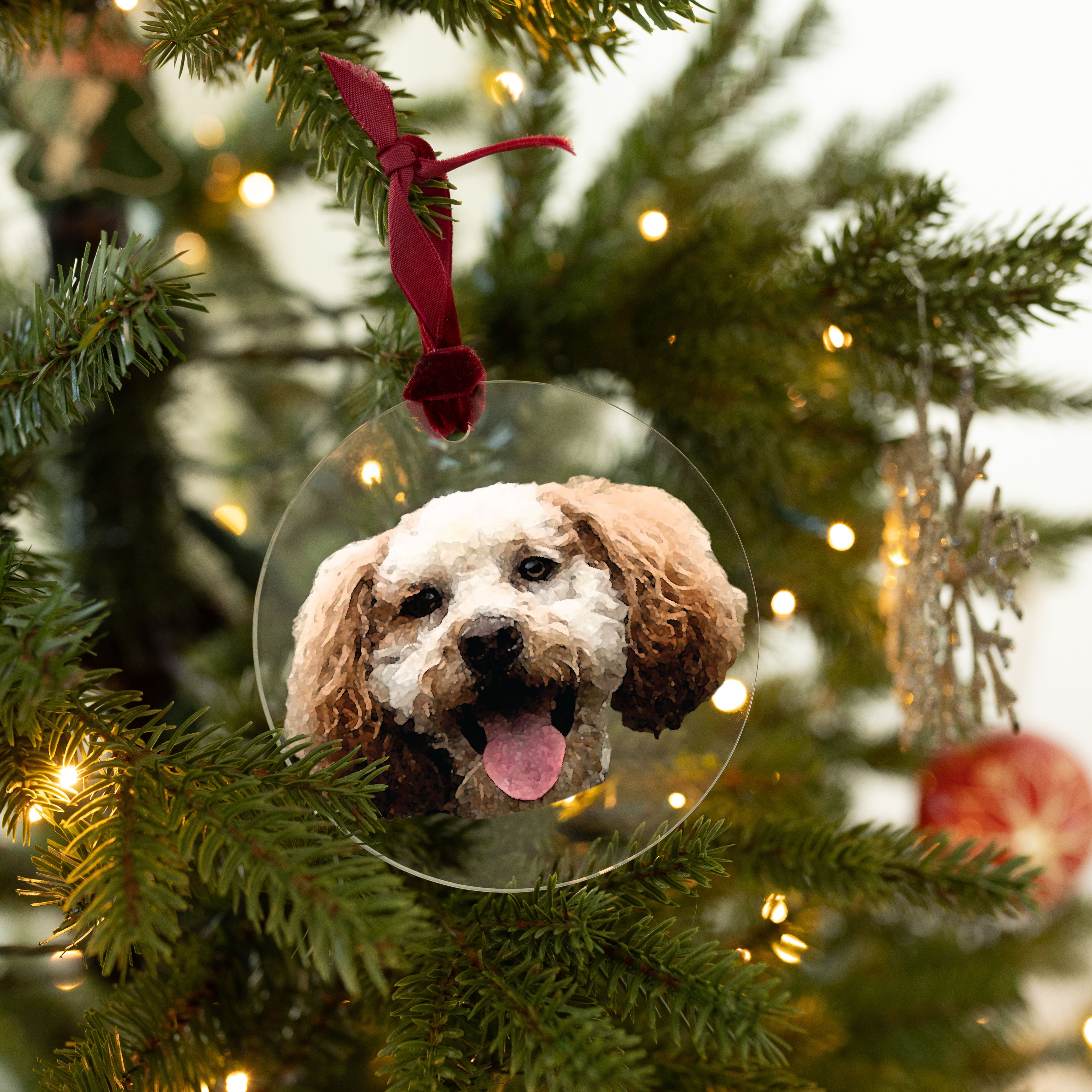 A dog ornament on a 4x4 inch clear acrylic circle. The dog is professionally printed in full color.