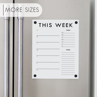 A Dry-erase weekly calender made of acrylic hanging on the fridge