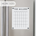 A Dry-erase monthly calender made of acrylic hanging on the fridge